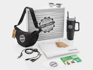 swag box branded with company logo and filled with promotional merchandise